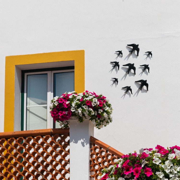 Black ceramic swallows from Portugal