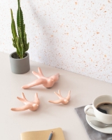 Pale pink ceramic swallow